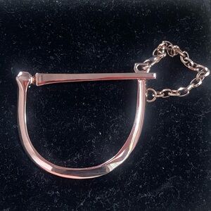 Stamped REBECCA MINKOFF rose gold lock bracelet